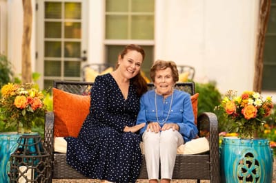 Resident and staff member enjoying time in an outdoor space