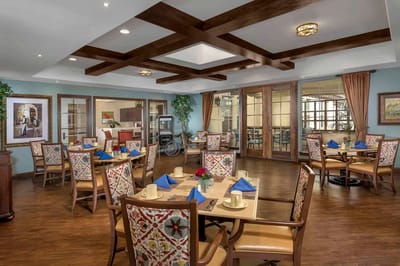 Bright dining area with tables and chairs