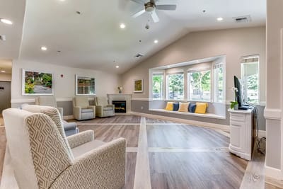 Bright common area with seating and natural light