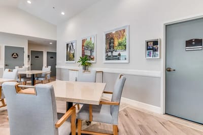 Bright common area with seating and artwork