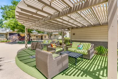 Outdoor seating area with shaded furniture