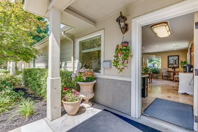 Entrance area of a senior living facility with plants