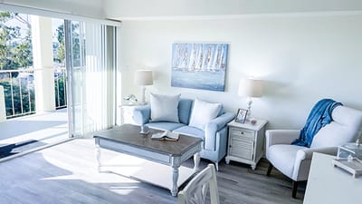 Bright, well-furnished common area in a senior living facility