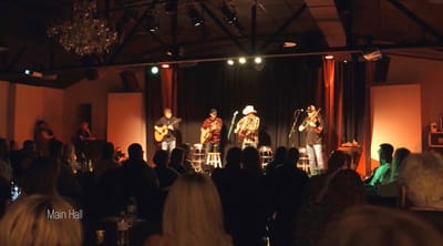 Residents enjoying live music in the main hall