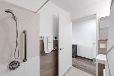 Clean interior view of a bathroom in a resident room