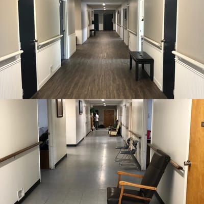 Hallway inside assisted living facility with seating
