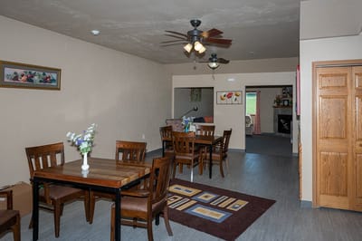 Common area with seating and dining tables