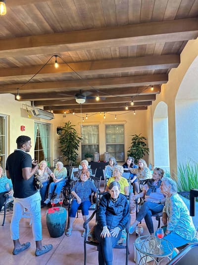 Residents enjoying a music activity in a common area