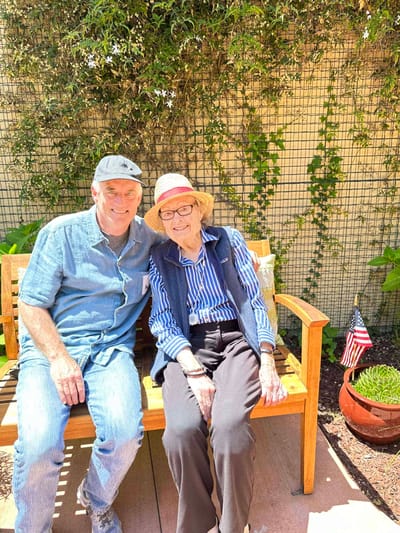 Residents enjoying time together in an outdoor garden