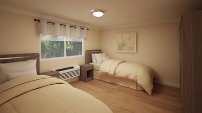 Shared resident room with two beds and natural light