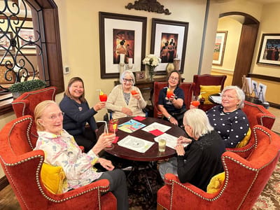Residents enjoying beverages together in a common area