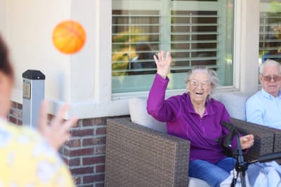 Residents enjoying outdoor activities at the facility.