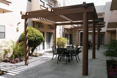 Outdoor courtyard with seating and landscaping