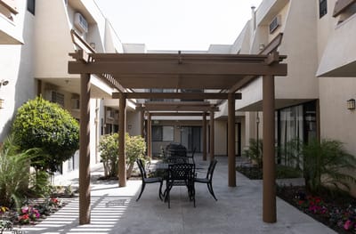 Outdoor courtyard with seating and landscaping