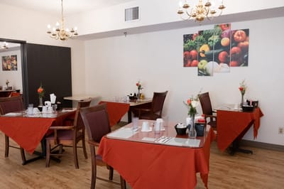 Dining area with tables set for meals