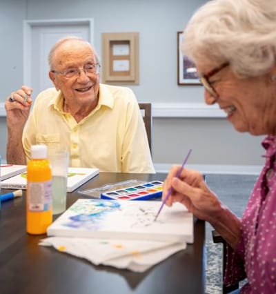 Residents participating in an art activity
