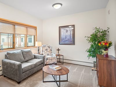 Bright and inviting lounge area with seating and décor