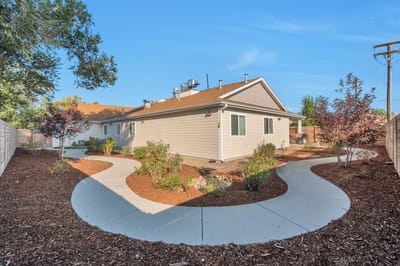 Exterior view of a senior care facility with landscaping