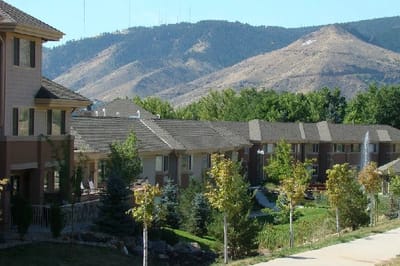 View of the assisted living facility with mountains in the background