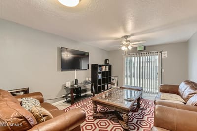 Cozy common area with seating and television