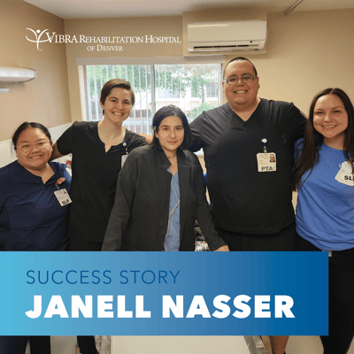Staff and resident celebrating a success story