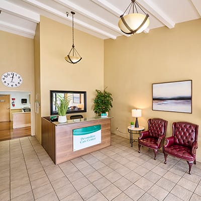 Indoor lobby with reception desk and seating area