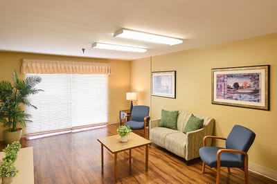 Bright common area with seating and natural light