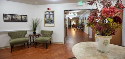 Interior common area with seating and floral decor