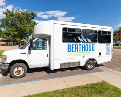 Facility shuttle van parked outside