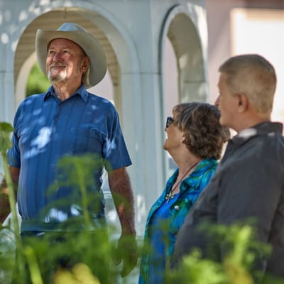 Residents enjoying a sunny day in a garden