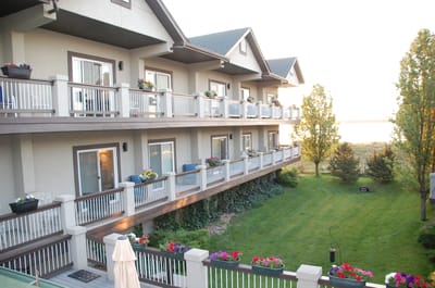 Exterior view of the building with balconies and garden