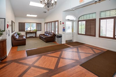 Interior view of a cozy common area with seating