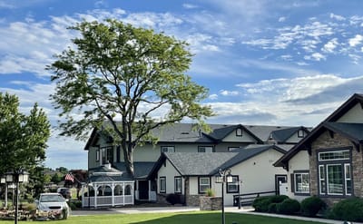 Exterior view of the facility with landscaping
