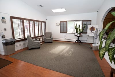 Bright interior lobby with seating and plants