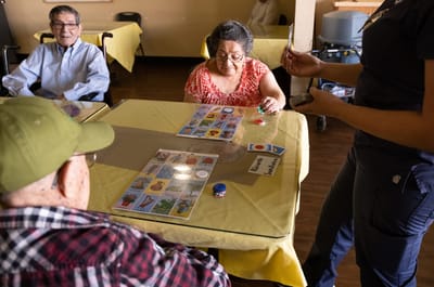 Residents playing bingo during an activity session