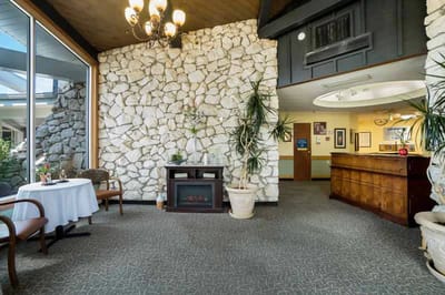 Common area with fireplace and seating
