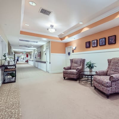 Bright interior hallway with seating area