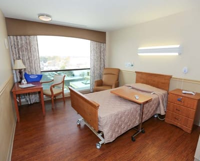 Cozy resident room with a bed and view