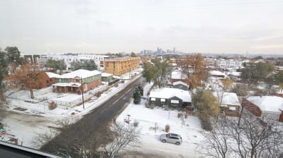 Snowy view of residential area near the facility