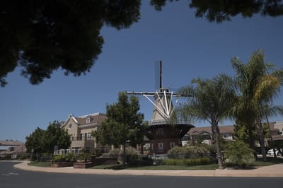 Exterior view of a facility with a windmill structure