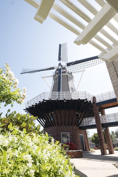 Exterior view of a windmill feature in the facility