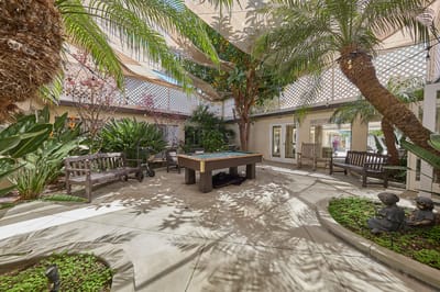 Beautiful outdoor courtyard with seating and greenery