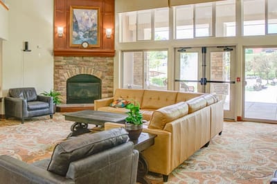 Cozy common area with seating and fireplace