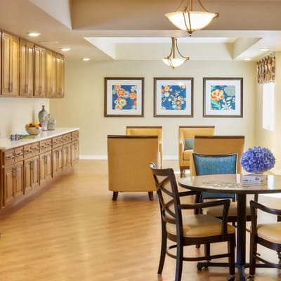 Bright common area with seating and artwork