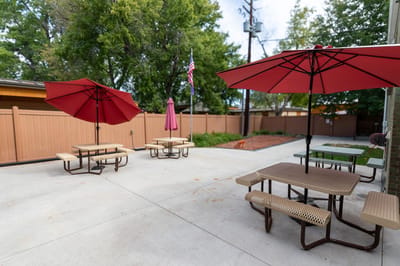 Outdoor seating area with umbrellas and tables