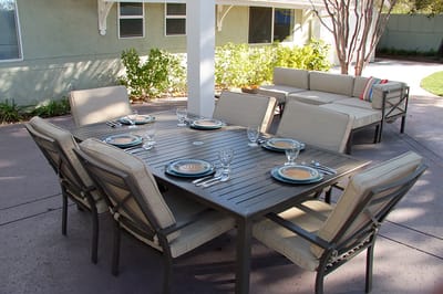 Outdoor dining area with a table and chairs