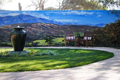 Outdoor seating area with a scenic backdrop