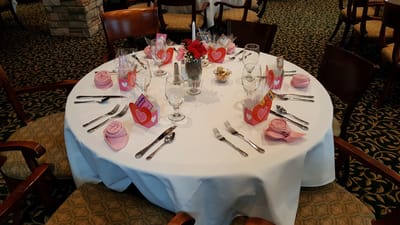Beautifully set dining table with decorations