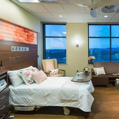 Community Hospital, Nursing Home in Grand Junction, CO — Well-furnished private resident room with large windows