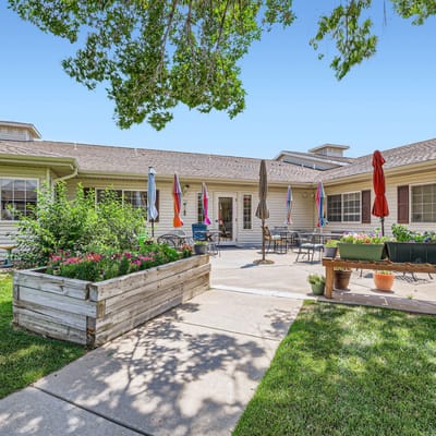Outdoor courtyard area with seating and garden